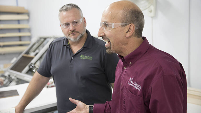 Koka team members representing their commitment to cabinet manufacturing innovation.