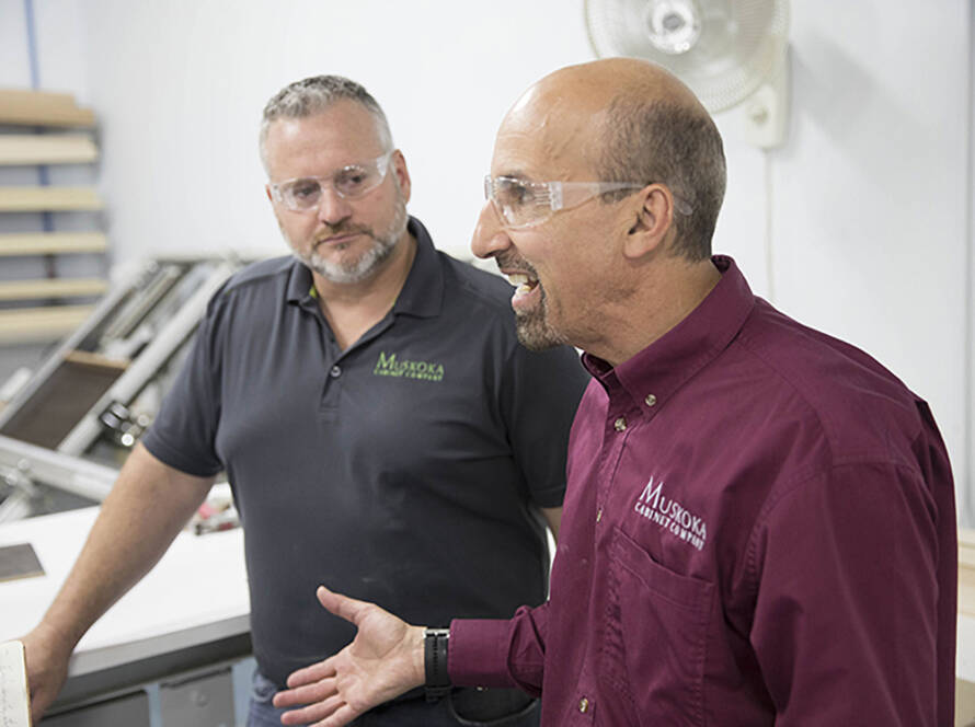 Koka team members representing their commitment to cabinet manufacturing innovation.