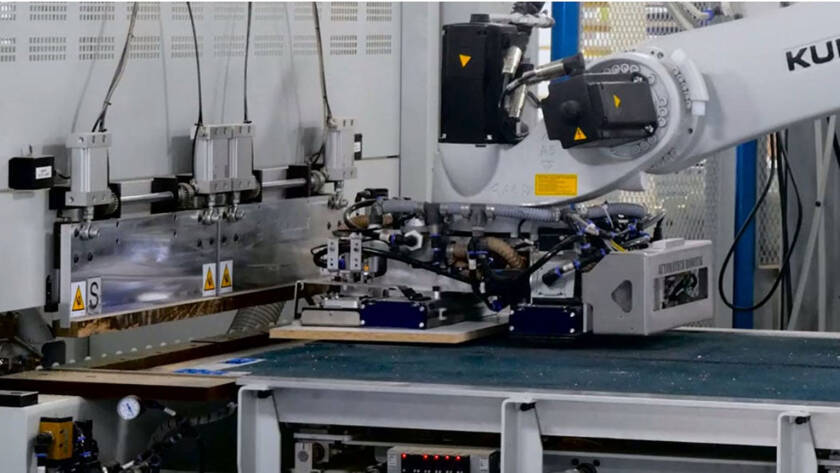 Automated robotic lean cell for panel processing highlighted in recent cabinet manufacturing news in Ontario.