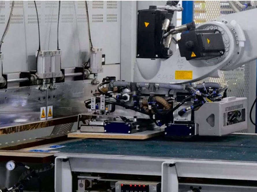 Automated robotic lean cell for panel processing highlighted in recent cabinet manufacturing news in Ontario.